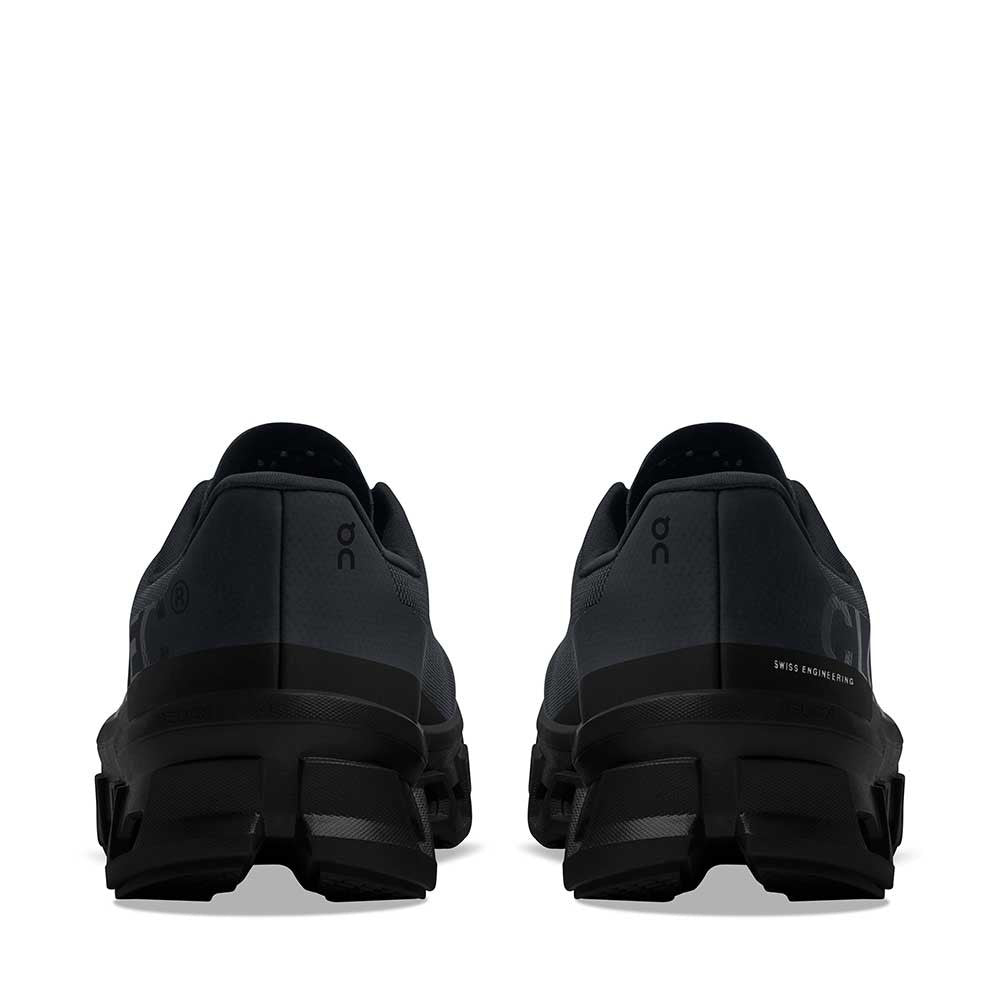 On Running Cloudmonster All Black Mens heel view - Hanig's Footwear