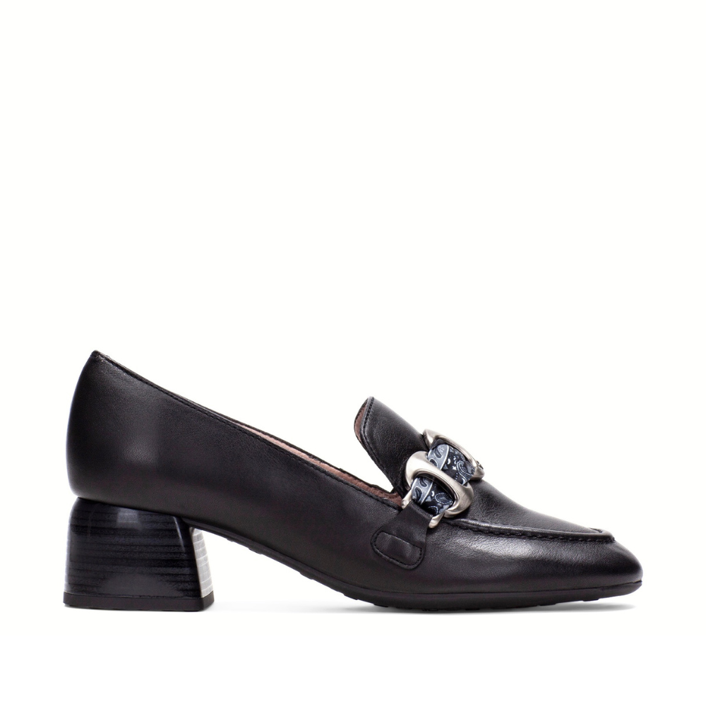 A single black leather loafer-style pump with a chunky block heel and a decorative silver-tone chain detail across the vamp, shown in profile against a plain white background.